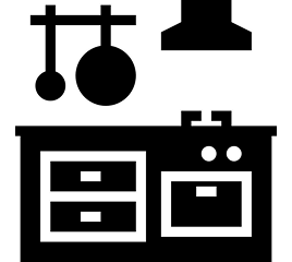 Silhouette of a person jumping with arms outstretched.