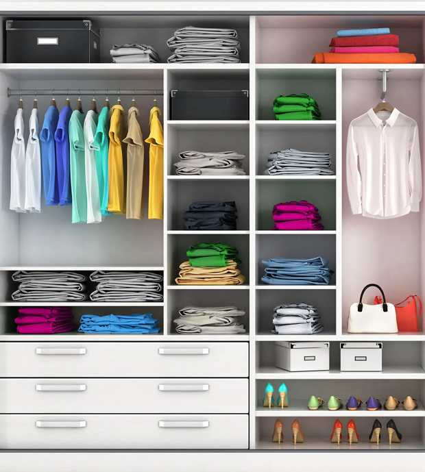 Organized closet with clothes, shoes, and accessories.